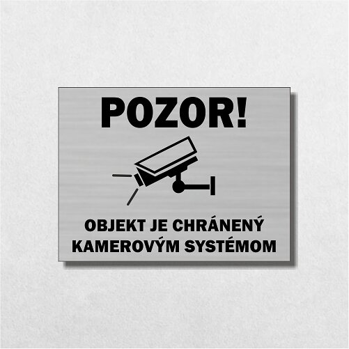strieborná tabuľka Pozor! Objekt je chránený kamerovým systémom